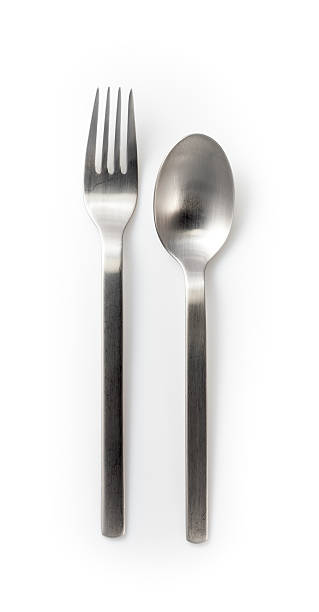 istock stainless steel fork and spoon isolated on a white background 186669754