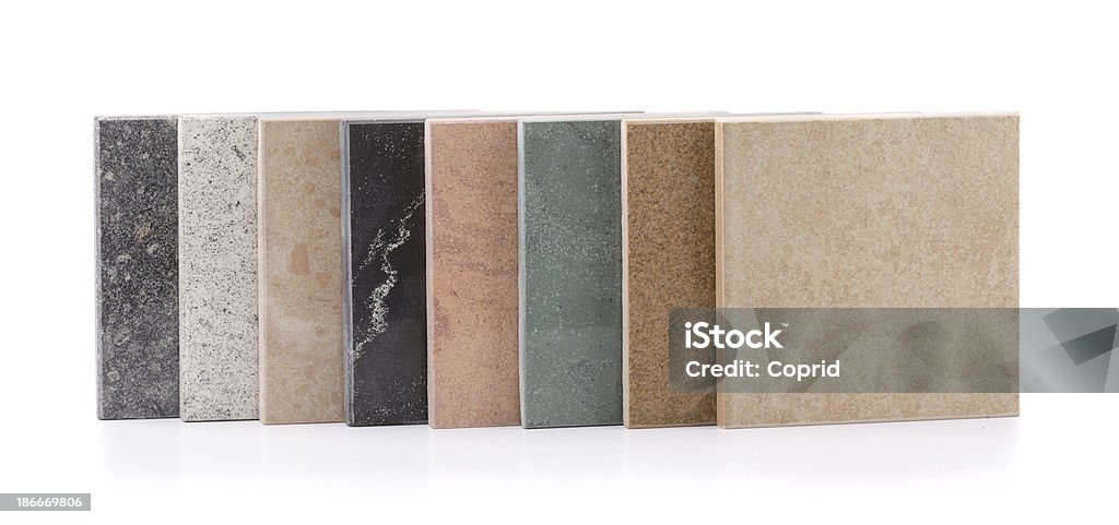 Eight different natural stone tiles Row of various natural stone tiles isolated on white Tile Stock Photo