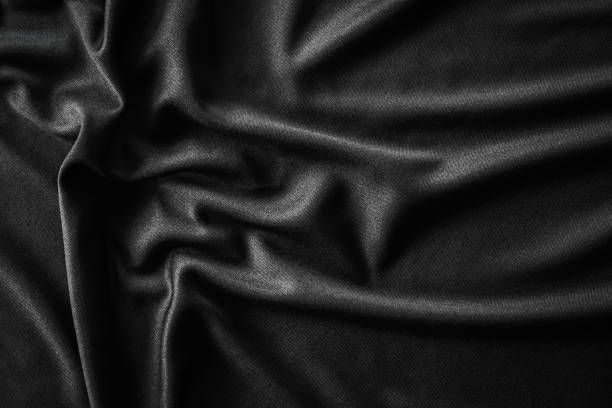 istock Black wrinkle shiny cloth texture can be use as background 1866700727