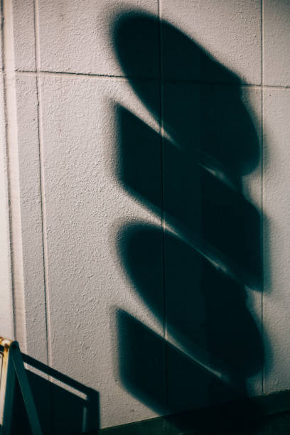 istock Shadows of road signs at night. 1866703309