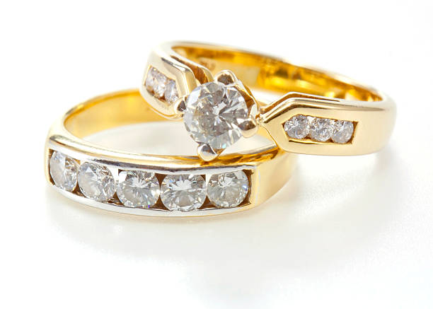 istock Two styles golden ring with diamond isolated  white backgro 186670657