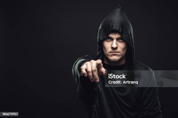Guy In The Black Robe Indicates You Stock Photo - Download Image Now - Adult, Adults Only, Alien