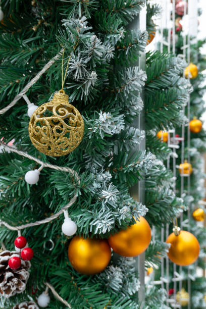 istock part of Christmas tree with decorations close up at vertical composition 1866710609