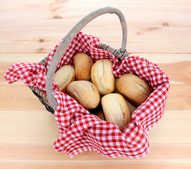 istock Rustic picnic basket of fresh bread rolls 186671456
