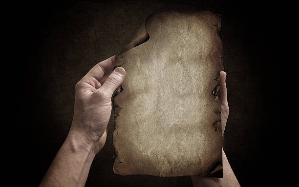 istock Old paper on the dark background 186672727