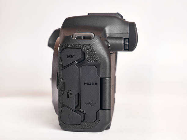 istock Digital mirrorless camera, side view of connectors. Microphone, headphones, HDMI, USB, remote control. 1866728234
