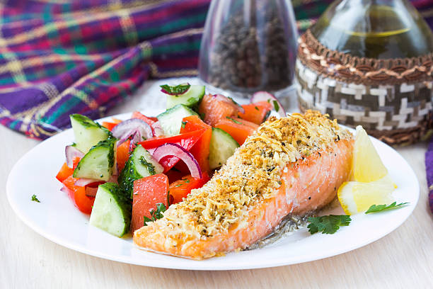 Steak fillet of red fish salmon with cheese crust breading stock photo