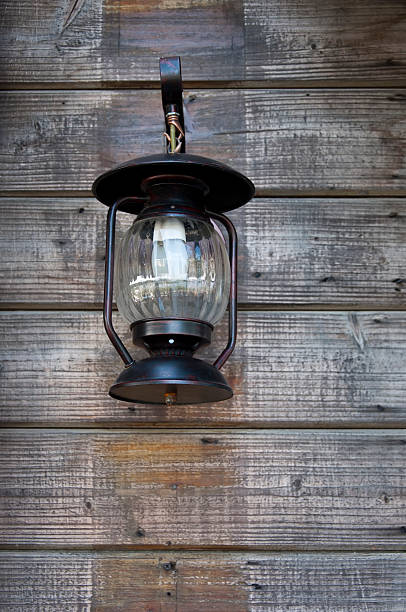 istock Old street light closeup on the wall 186674033