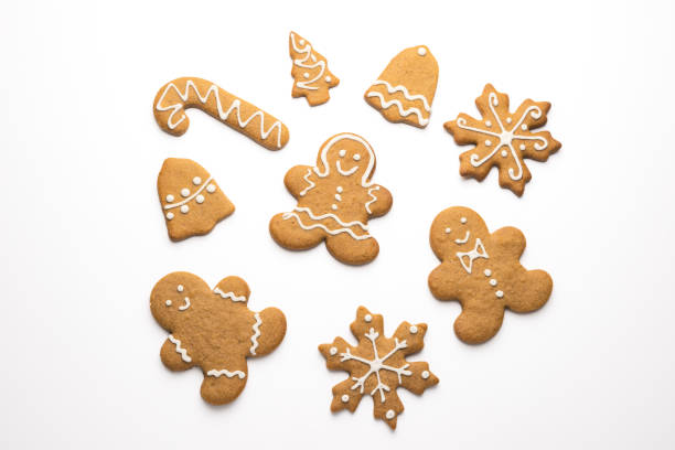 istock Gingerbread cookie of a Christmas tree with icing isolated on white background 1866748465