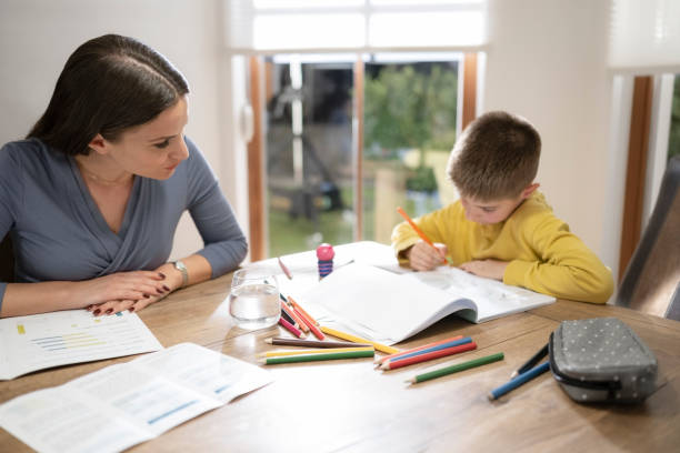 istock Mother and son sitting in dining room 1866755344