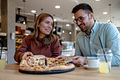 Shared pizza experience for couple