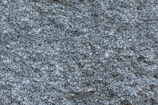 rough granite natural stone as background