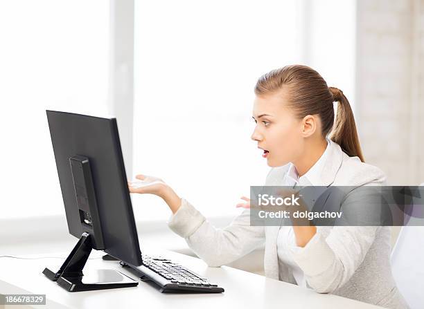 Stressed Student With Computer In Office Stock Photo - Download Image Now - Adult, Beautiful People, Beauty