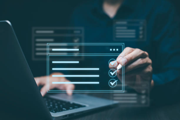 istock Checklist and clipboard task documentation management Online survey, form checklist by laptop computer, Document Management Checking System, online documentation database and process manage files. 1866787919