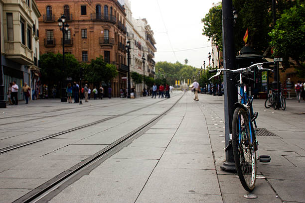 istock Bicycle stopped in lampost urban street 186678817