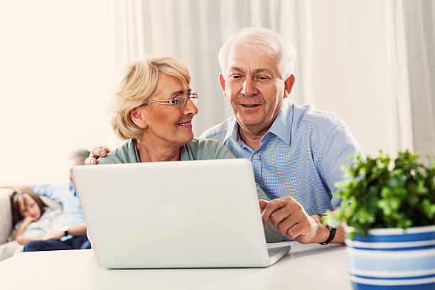 istock Senior couple with laptop 186678890