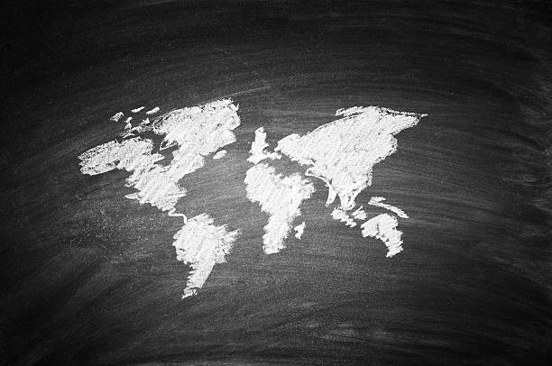 istock World map drawn in white chalk on blackboard 186679085