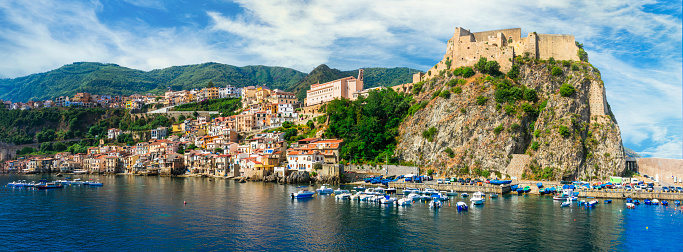 scenic places of Italy . beautiful beaches and towns of Calabria - medieval Scilla town . Italian summmer holidays.