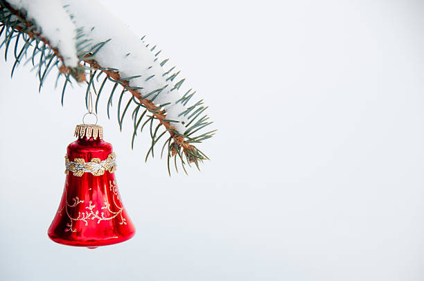 istock Christmas ornament on outdoor pine tree with snow 186679885