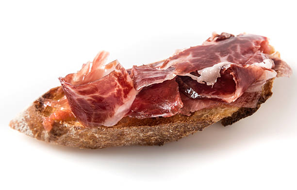 curados jamón serrano canapé (montadito de jamon) - alimento tostado fotografías e imágenes de stock