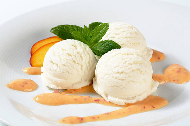 eis-dessert - peach nectarine fruit portion stock-fotos und bilder