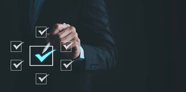 istock Checklist and clipboard task documentation management Online survey, form checklist by laptop computer, Document Management Checking System, online documentation database and process manage files. 1866815293