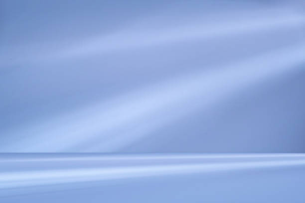 istock Wall interior background, studio and backdrops show products.with shadow from window color white and blue light. background for text insertion and presentation product 1866817362