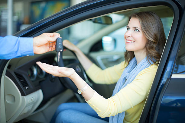 istock Woman bying car. 186681846