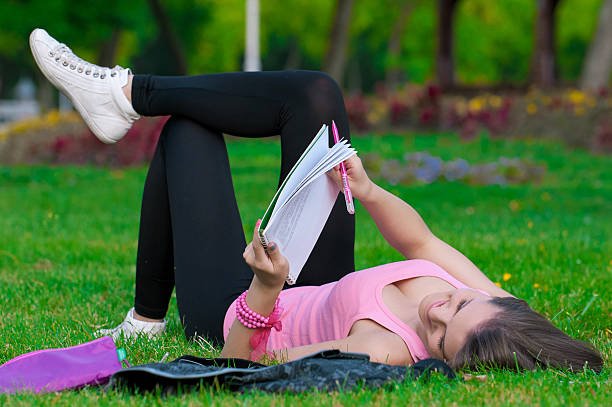 istock young high school student or college girl 186682099