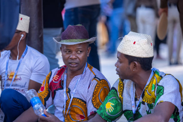 Faridabad, Haryana, India - February 2023:  Foreigner vendors participating in surajkund craft fair to sell their products. Surajkund is a international craft fair where people come and sale and buy craft products.