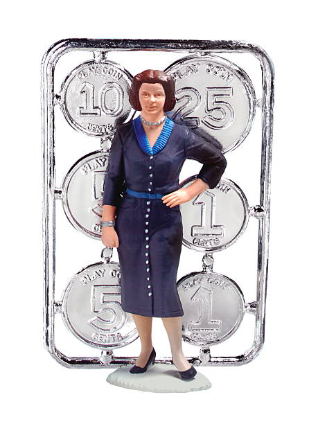 istock Woman Standing in Front of Coins 186682429