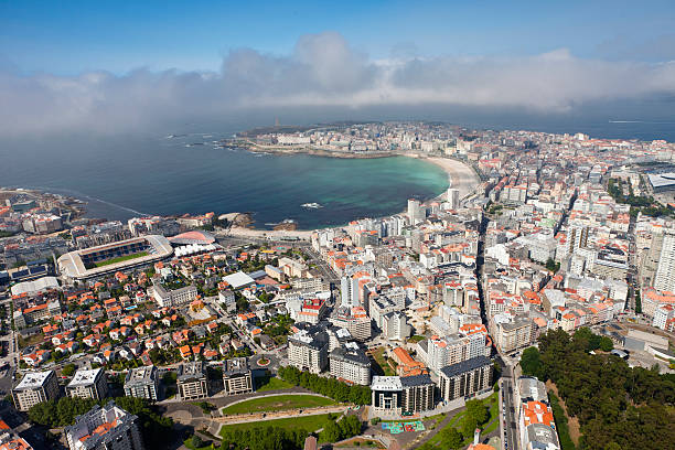 Coruña aerial view Aerial view of A Coruña with the beaches of Riazor and Orzán. a coruna province stock pictures, royalty-free photos & images