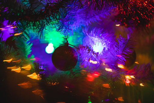 Christmas tree decorations at night. Close-up.