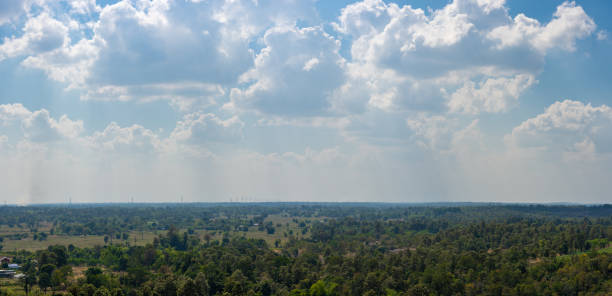 Sky and clouds over hill and land background panorama view