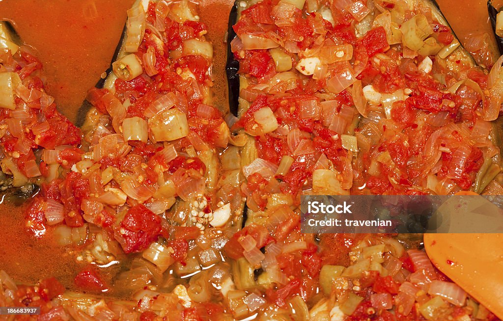 Eggplants with minced meat Whole slitted aubergines with seasoned minced meat filling Baked Stock Photo