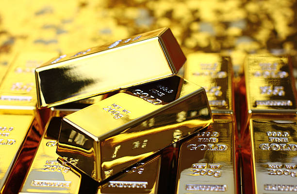 Gold Bars Gold Bars bringing home the bacon stock pictures, royalty-free photos & images