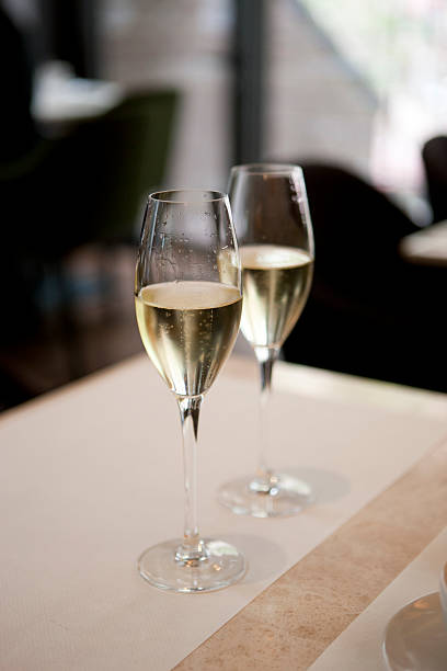 Champagner in glasses on salver with napkin