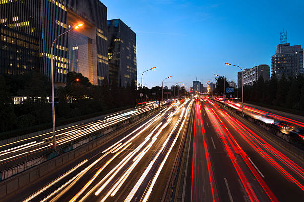 istock Rush hour traffic at night on multiple lane highway 186684689