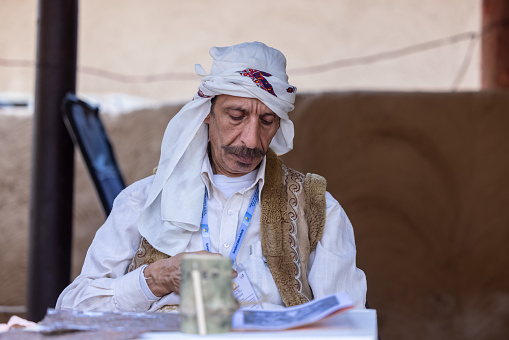 Luxor, Egypt - November 07, 2021: Close up Portrait of the Local Egyptian Old Man in Traditional Clothes