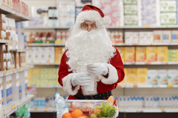istock Shocked Santa Claus checking the grocery receipt 1866850524