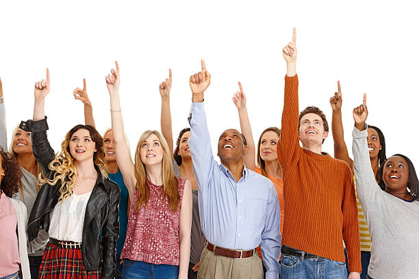 istock Diverse group of people pointing upwards 186685228