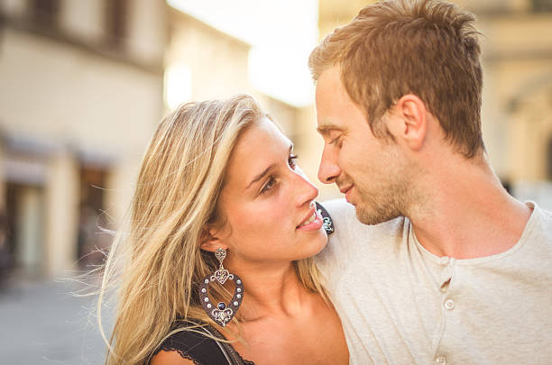 istock Cheerful couple smiling on the city 186685272