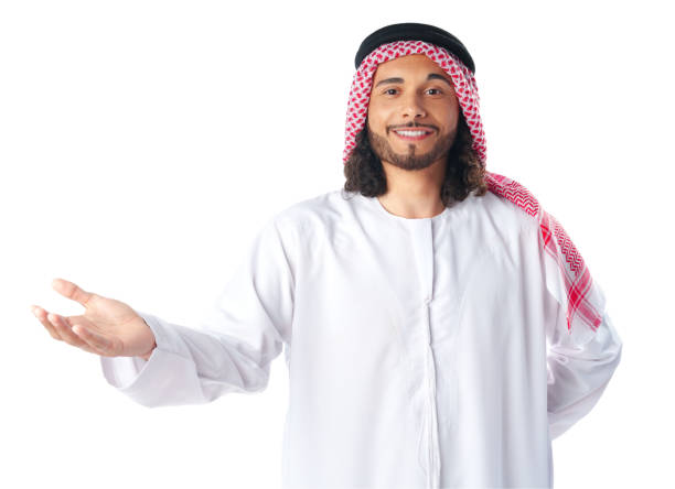 istock Arab saudi young man pointing to side isolated on a white background 1866854314