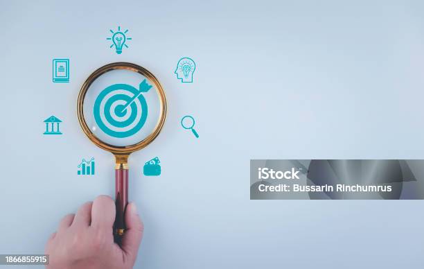 Target Board Inside Of Magnifier Glass For Focus Business Objective On Blue  Background And Copy Space Stock Photo - Download Image Now - iStock