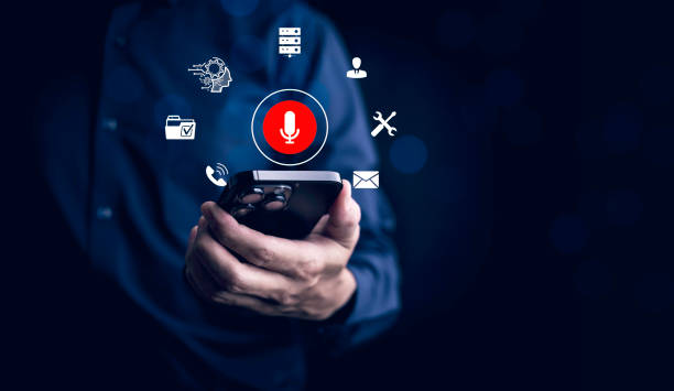 istock Businessman using smartphone touch microphone button on virtual screen. Blog blog speak talk advertising presentation,Voice recognition, speech detection and deep learning application,Voice Assistance 1866866524