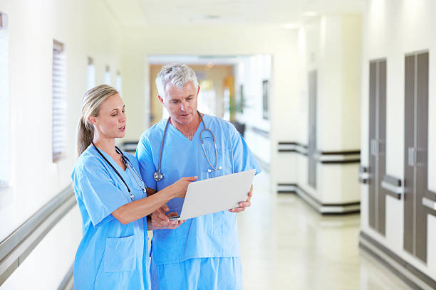 istock Working together to diagnose a patient 186687658