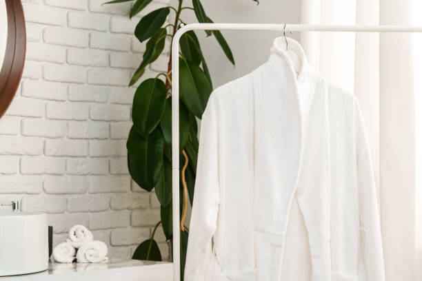 istock White robe on the rack in the bathroom 1866878889