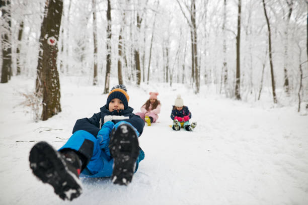 istock Beautiful children enjoying winter day 1866891793