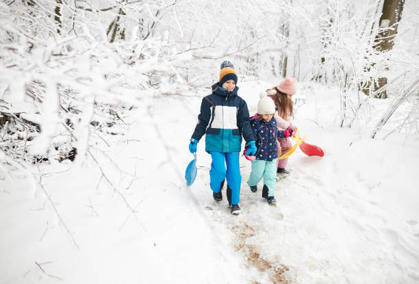 istock Beautiful children enjoying winter day 1866893919
