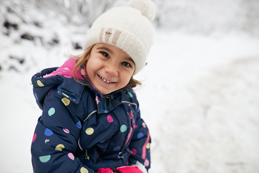 Portrait of a beautiful girl on a winter day.